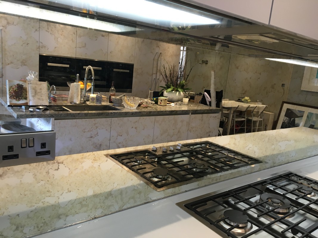 Mirror glass splashback in Rotherhithe luxury kitchen