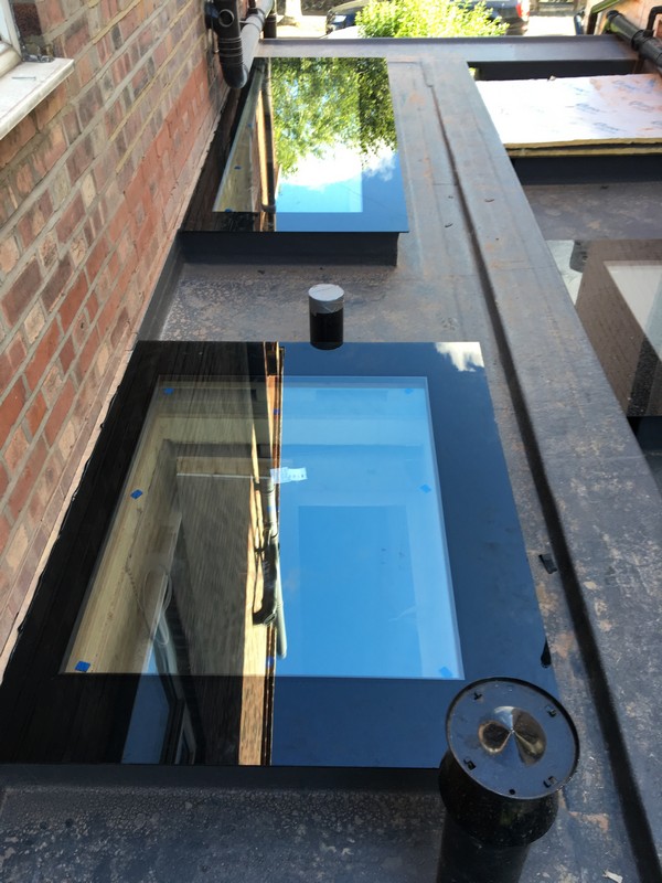 Multiple flat roof skylights on extension in Rotherhithe